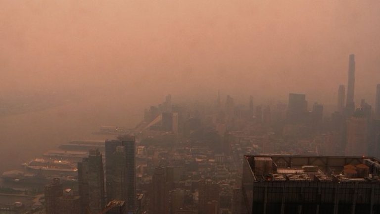 Raging wildfires in Quebec drive intense smoke and hazy skies farther across the eastern US and Canada