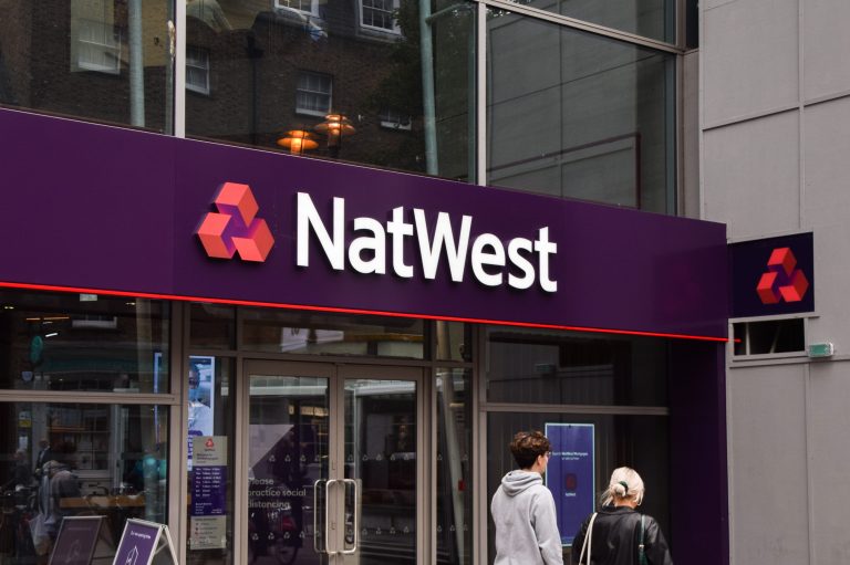 NatWest cuts guidance as pressure grows on the board over Farage case