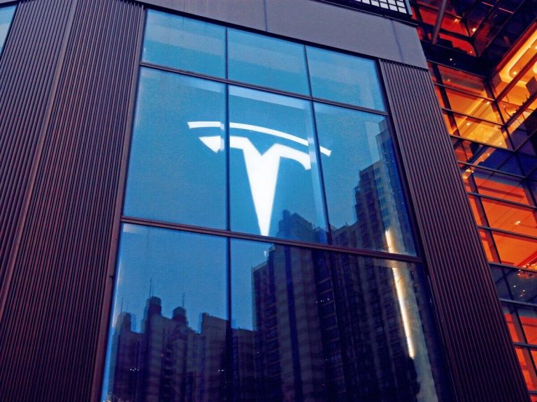 Wall Street higher amid a Tesla-led EV rally