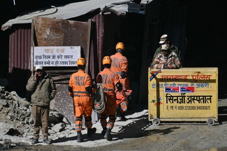Indian rescuers dig past halfway mark in efforts to reach trapped workers