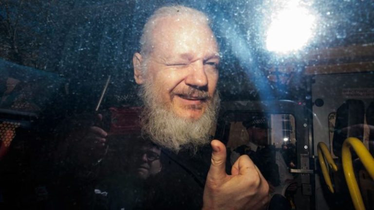 Squad and Marjorie Taylor Greene join 16 lawmakers calling on Biden to free Julian Assange