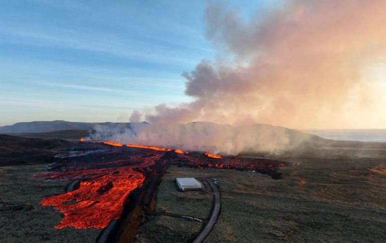 Buildings burn as lava from Icelandic volcano eruption flows into evacuated fishing town