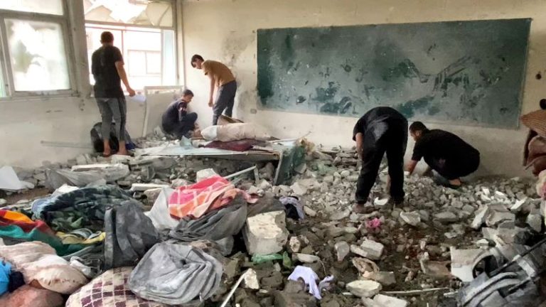 Israeli airstrike kills dozens sheltering in UN school, Gaza officials say
